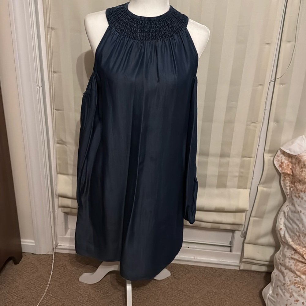 Given Kale dress. Like new condition. Peekaboo sleeves. Size small.